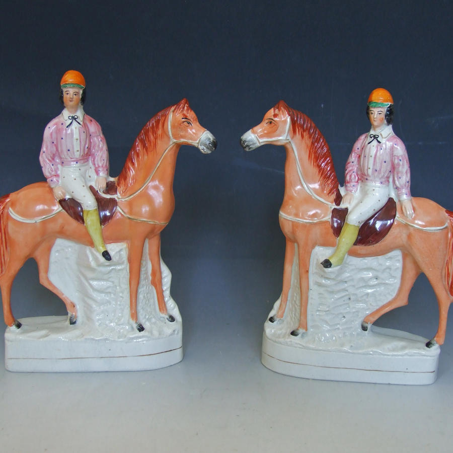 Large pair of Staffordshire mounted jockeys