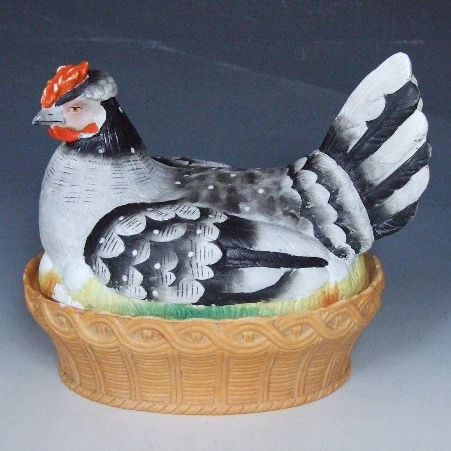 Large French bisque hen on nest