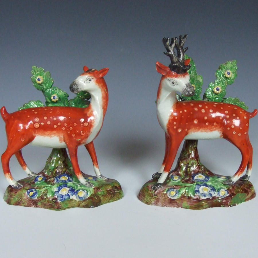 Pair of early Staffordshire stag figures