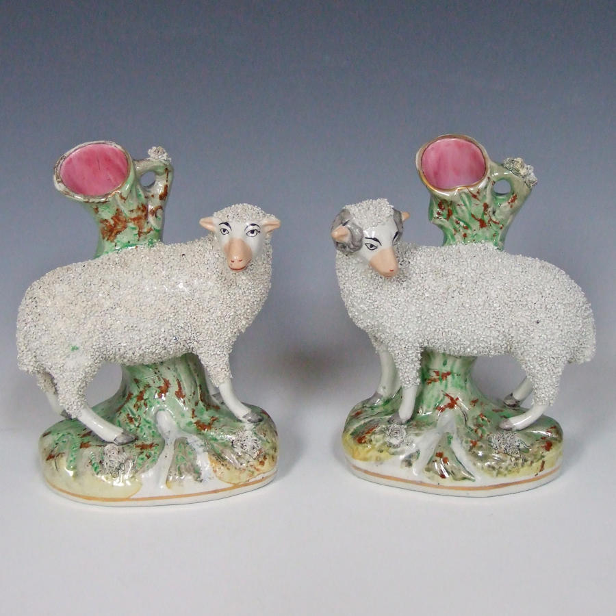 Pair of large Staffordshire sheep spills