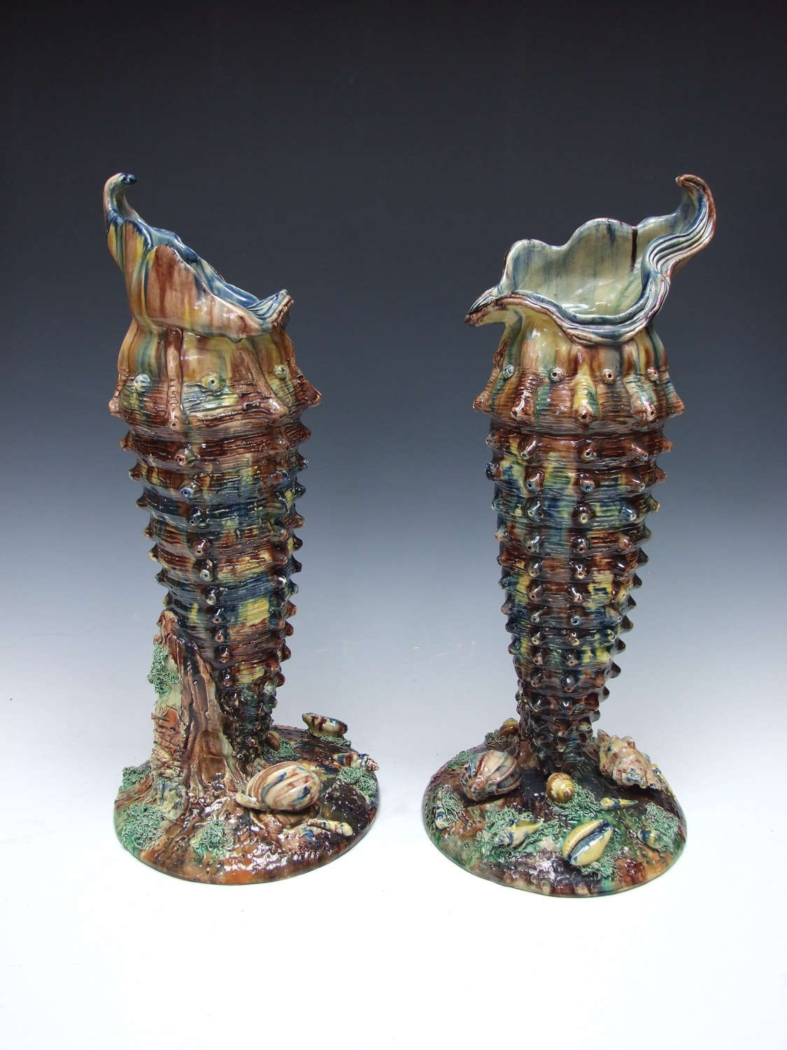 Fabulous pair of highly unusual tall Palissy shell vases