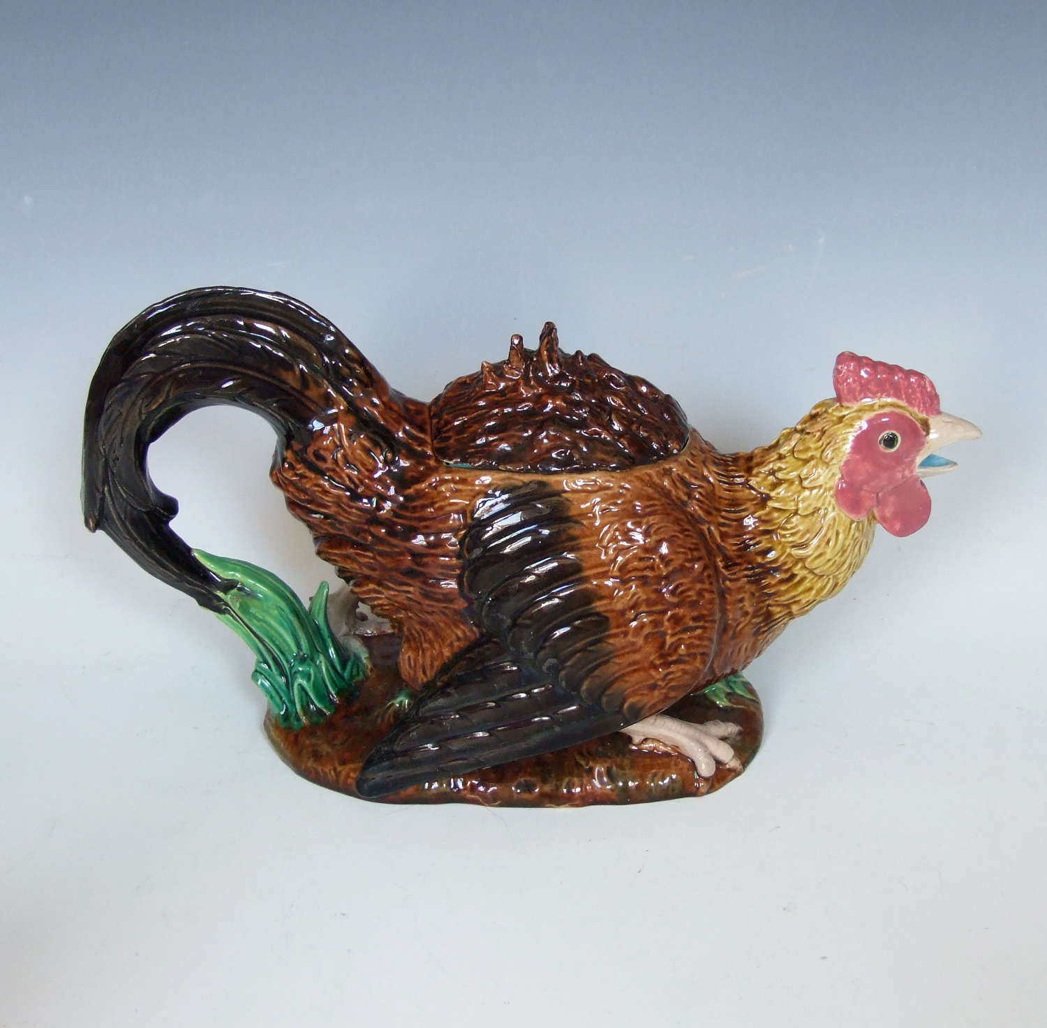A fine and rare English majolica rooster teapot by George Jones.