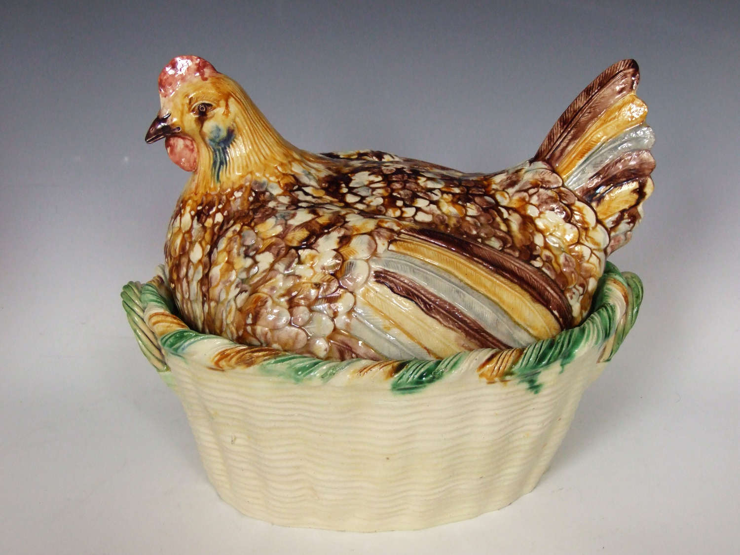 Highly unusual, rare and impressive large Palissy hen on basket tureen