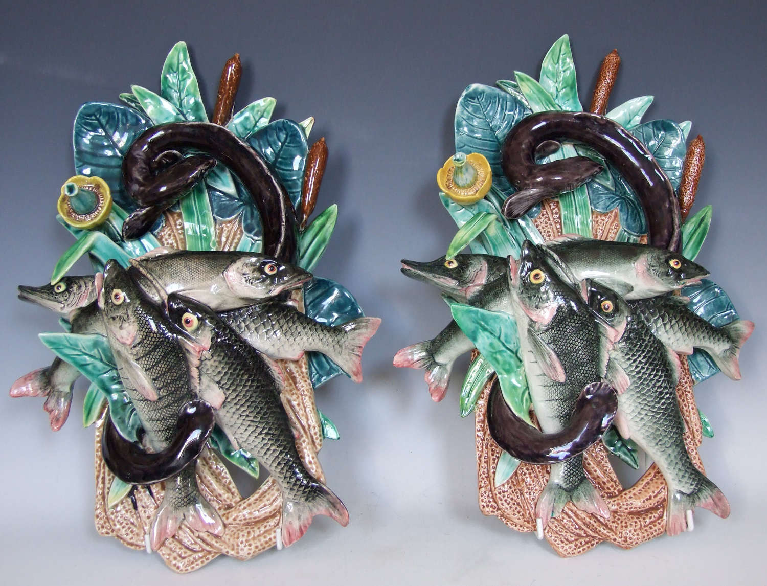 Rare pair of large French majolica fish motif wall pockets by De Bruyn