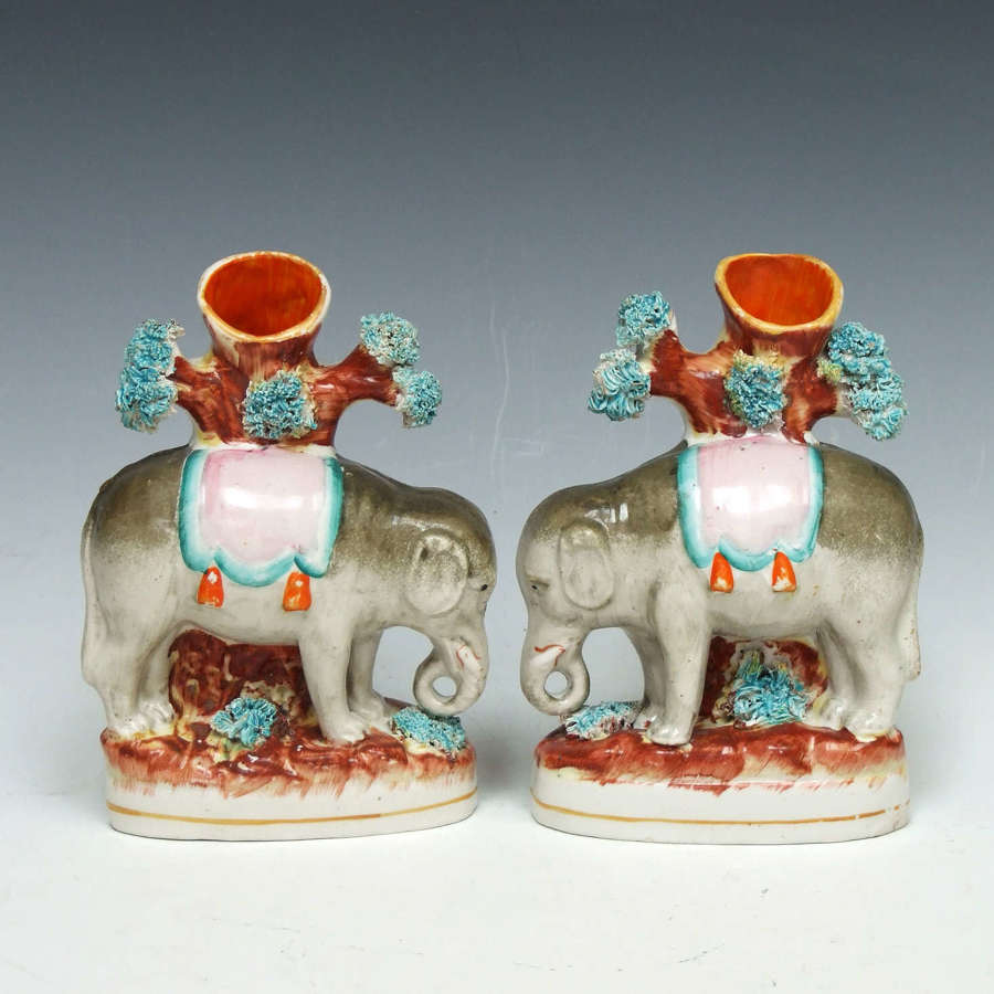 Fine pair of Staffordshire elephant spill vases
