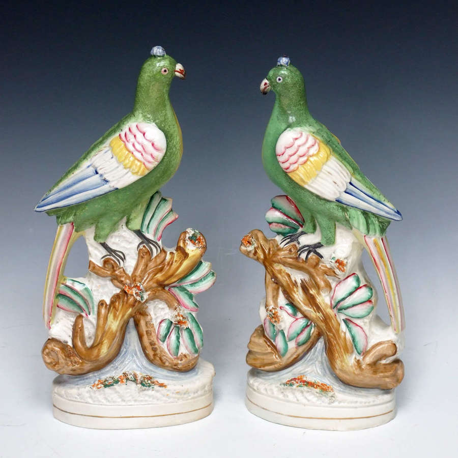 Rare pair of large Staffordshire parrot figures