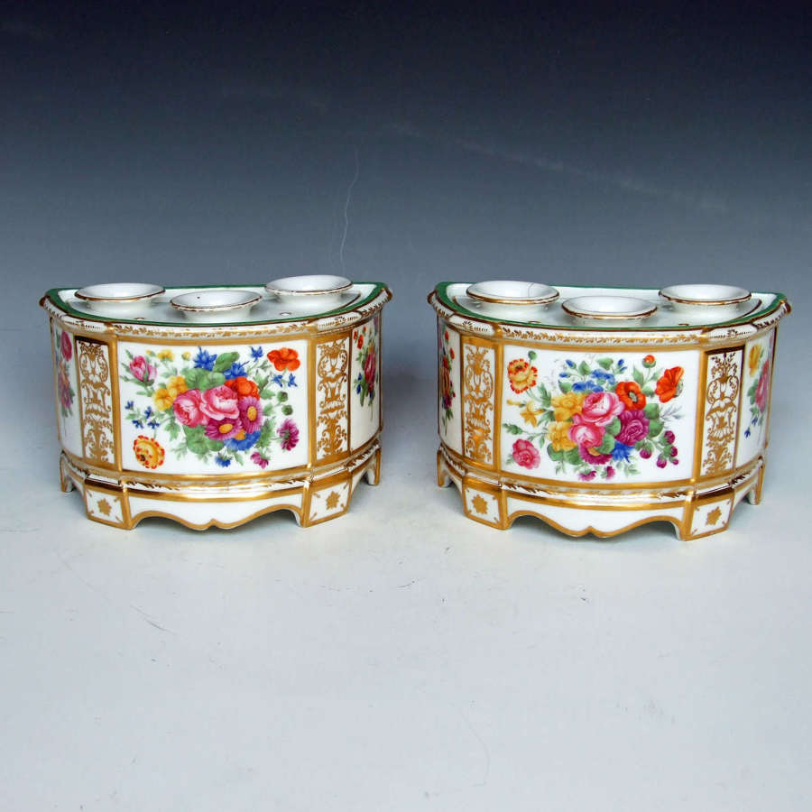 Exceptional pair of painted porcelain bough pots and covers